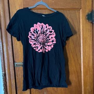 Black T-Shirt with Pink Floral Design.